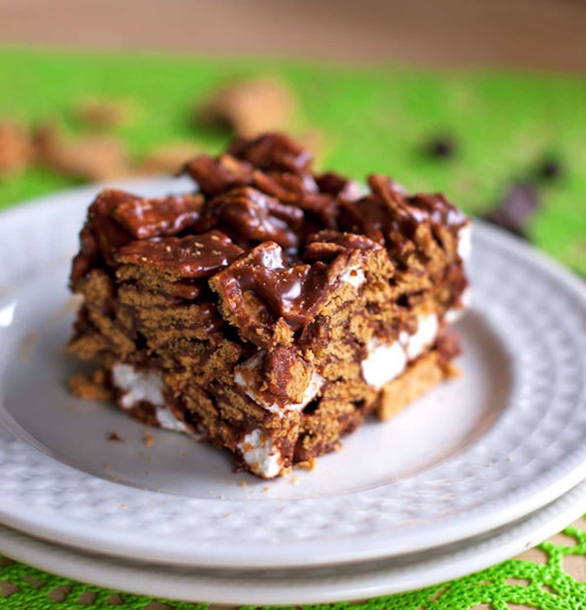 Golden Grahams s'mores bar on a white plate.